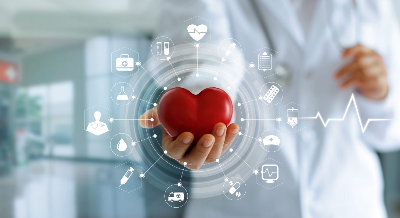 Medicine doctor holding red heart shape in hand and icons medical network connection with modern virtual screen interface, medical technology network concept Medicine doctor holding red heart shape in hand and icon medical network connection with modern virtual screen interface, medical technology network concept
